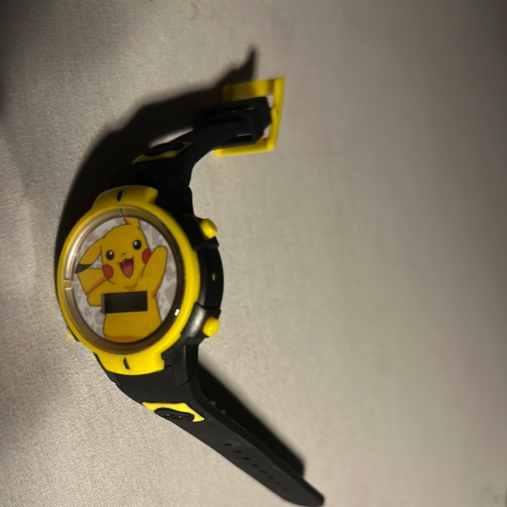 Vintage. Collectible. Pikachu Yellow and Black Digital Watch.